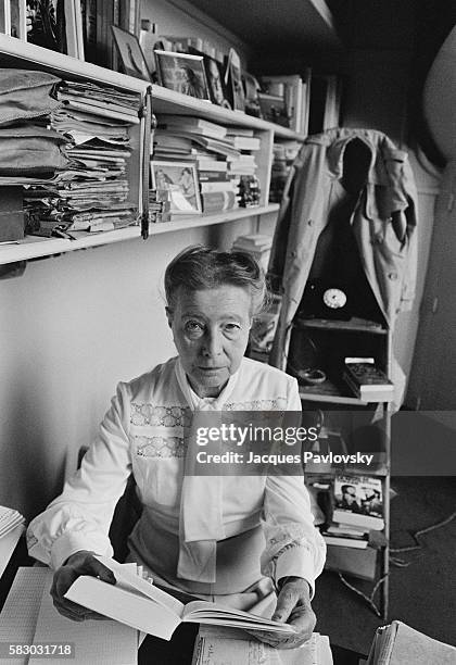 French author Simon de Beauvoir in her Parisian apartment. Simone de Beauvoir is renowned for her book "The Second Sex."