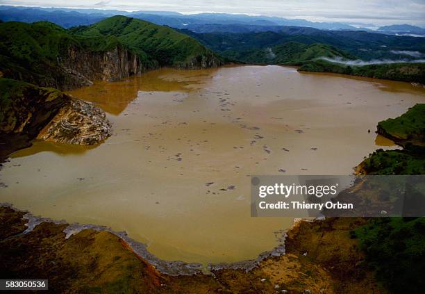 The waters Lake Nyos near Wum, Cameroon, have turned a murky brown following a deadly release of toxic gas. In August of 1986, the lake, which is...