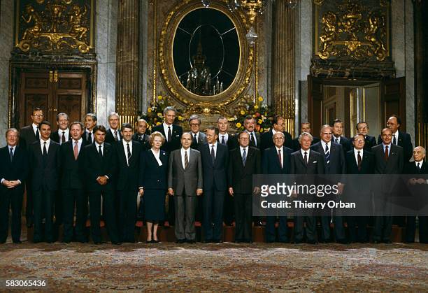 Heads of state meet for the Brussels European Union Summit. Attendees include British Prime Minister Margaret Thatcher; French President Francois...
