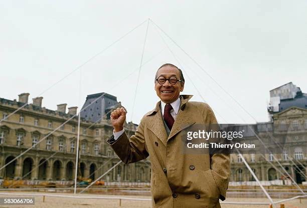Chinese American Architect Ieoh Ming Pei stands next to a full size simulation of the his Louvre Pyramid during a press conference in Paris.