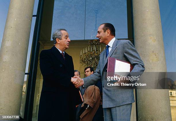 French Economy and Finance Minister Edouard Balladur shakes hands with Prime Minister Jacques Chirac. The French ministers gathered in Paris for a...