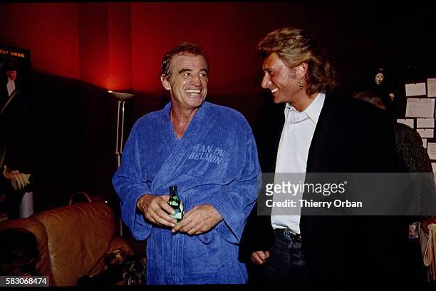 Johnny Hallyday came to congratulate Jean-Paul Belmondo in his dressing room.