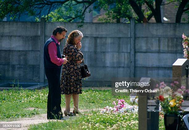 Albert and Monique Villemin, the grandparents of Gregory Villemin, visit the grave of their grandson. Young Gregory was found murdered in the Vologne...