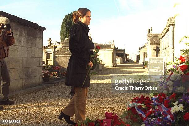 Mazarine Pingeot lays a rose on her father's tomb. He died on January 8, 1996.