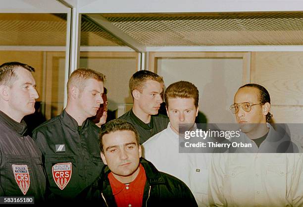 Marco Di Caro, Lucien Ferri and Stephane Ali Guechguech under heavy escort.