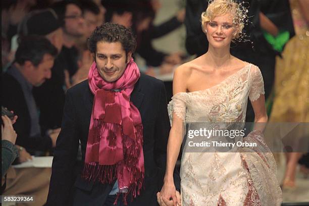 Pascal Millet, the designer of Carven, with a model wearing a wedding dress.