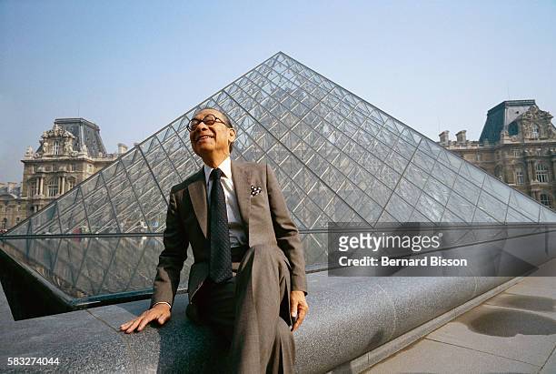 Architect I.M. Pei sits near the Louvre's Pyramid Entrance, which he designed.