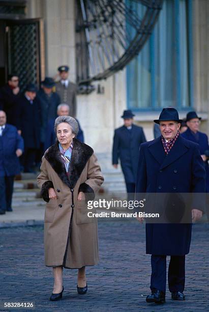 Romanian President Nicolae Ceausescu and wife Elena leave the closing ceremony of the Romanian Communist Party's 14th congress in Bucharest on...
