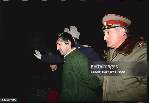 Bucharest , January 12, 1990. National mourning day. Arrest of a suspect.