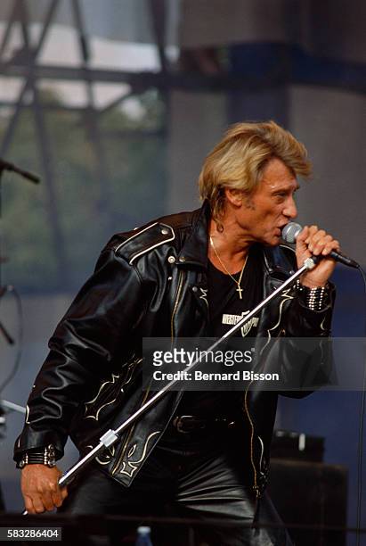 French rock singer, Johnny Hallyday, the highlight of the annual "Fete de l'Humanite" music festival weekend, organised by the French Communist...
