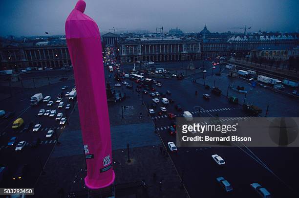 A GIANT CONDOM PLACED ON THE OBELISK IN PARIS