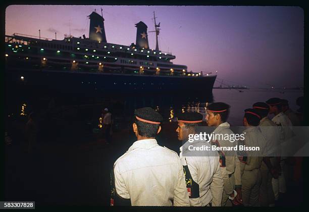 Egyptian soldiers stand guard in front of the hijacked Achille Lauro liner.