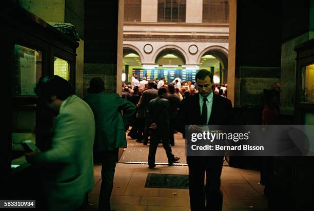 Traders busy themselves at the Paris Stock Exchange a few days after Black Monday on October 19 the largest market crash since Black Tuesday in 1929....