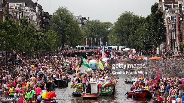 canal parade gay pride amsterdam - gay parade stock-fotos und bilder