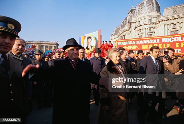 Late Romanian president Nicolae Ceausescu and wife Elena walk among the crowd after the closing ceremony of the Romanian Communist Party's 14th...