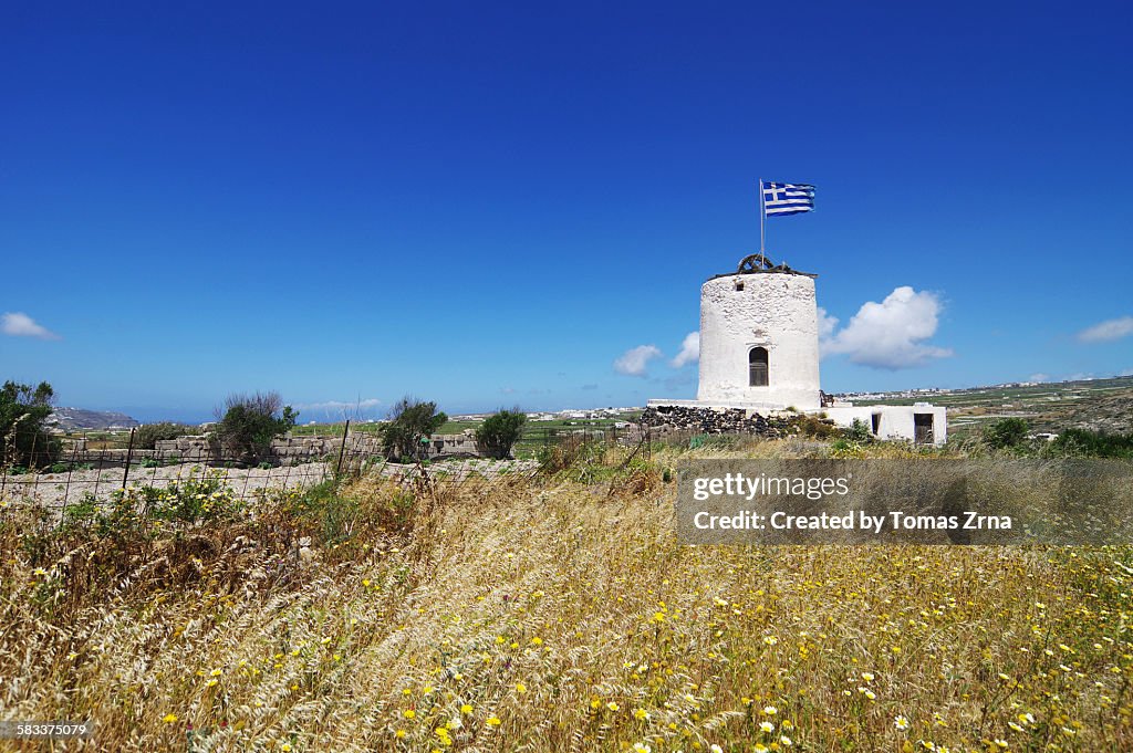 White windmills of Santorini