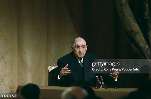 French General and President of France, Charles de Gaulle pictured conducting a question and answer session during a news conference at the Elysees...