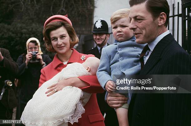 Princess Alexandra of Kent, The Honourable Lady Ogilvy pictured holding her newborn daughter Marina Victoria Alexandra Ogilvy alongside her husband...