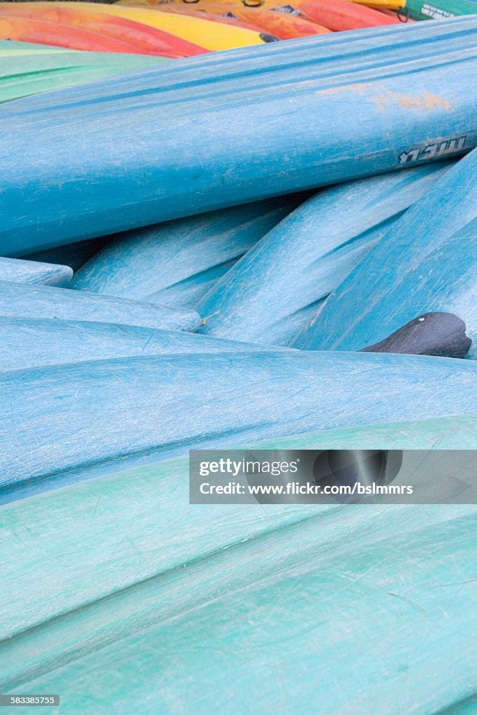 Pile of kayaks