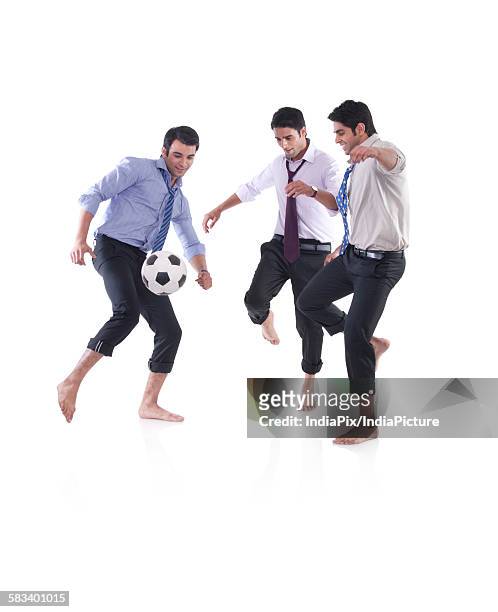 male executives playing soccer - indian football stock pictures, royalty-free photos & images