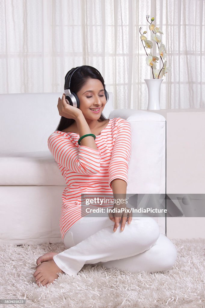 Young WOMEN listening to music