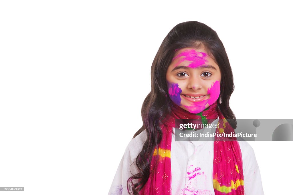 Portrait of a girl with holi colour