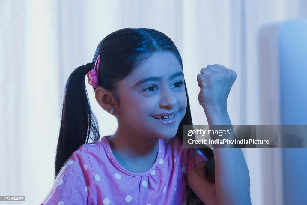 Young girl cheering