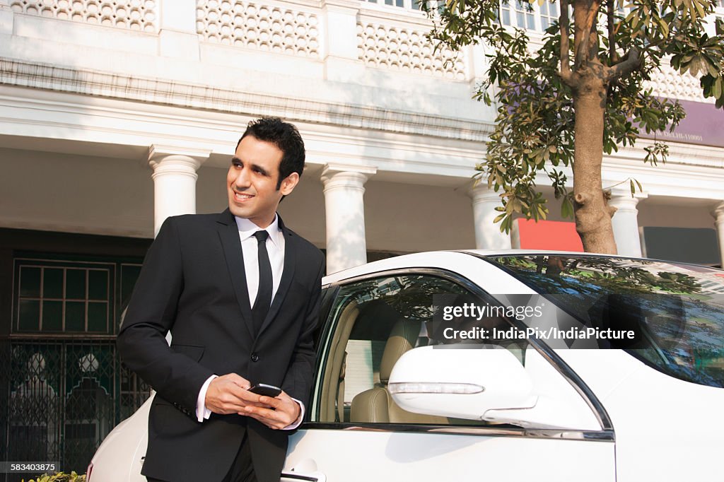 Businessman with a mobile phone , INDIA , DELHI