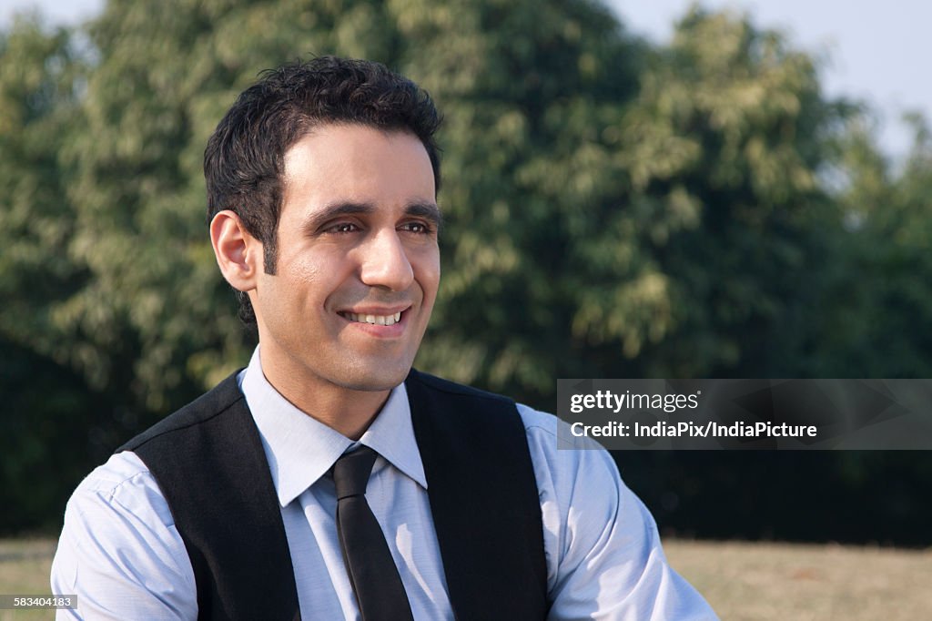 Businessman smiling , INDIA , DELHI