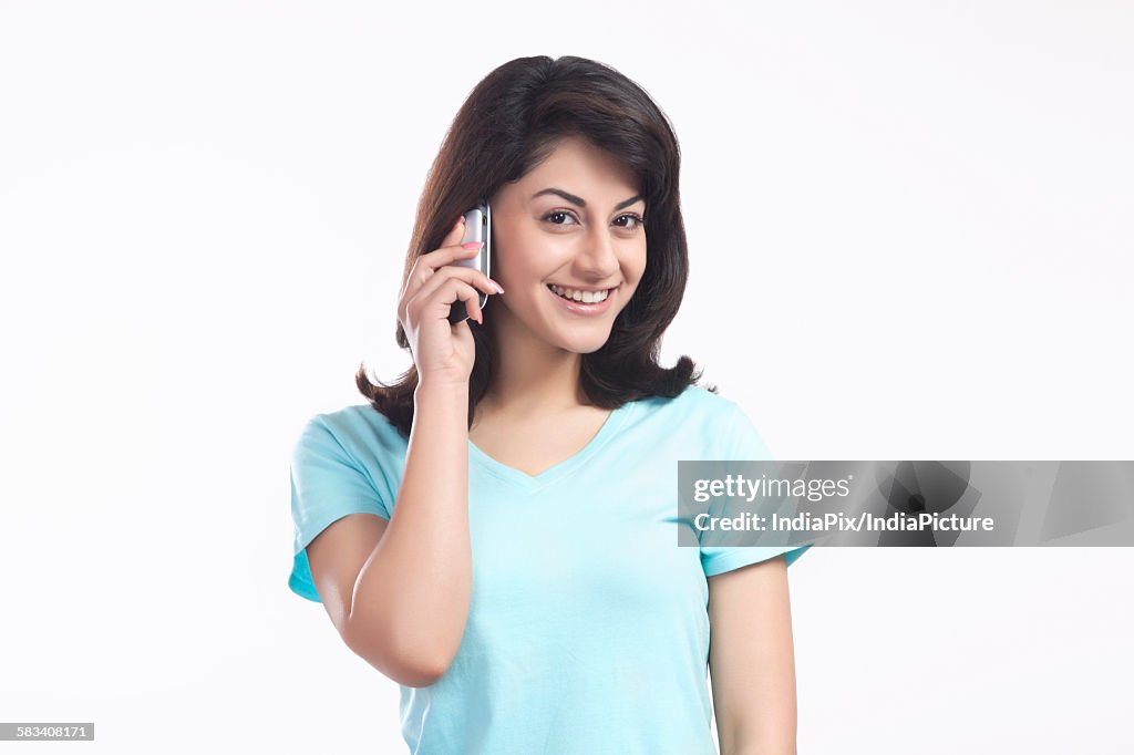Portrait of a woman talking on a mobile phone