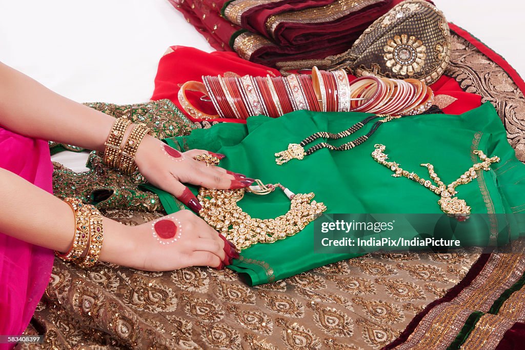 Close-up of jewelry , jewellery , bangles and wedding attire