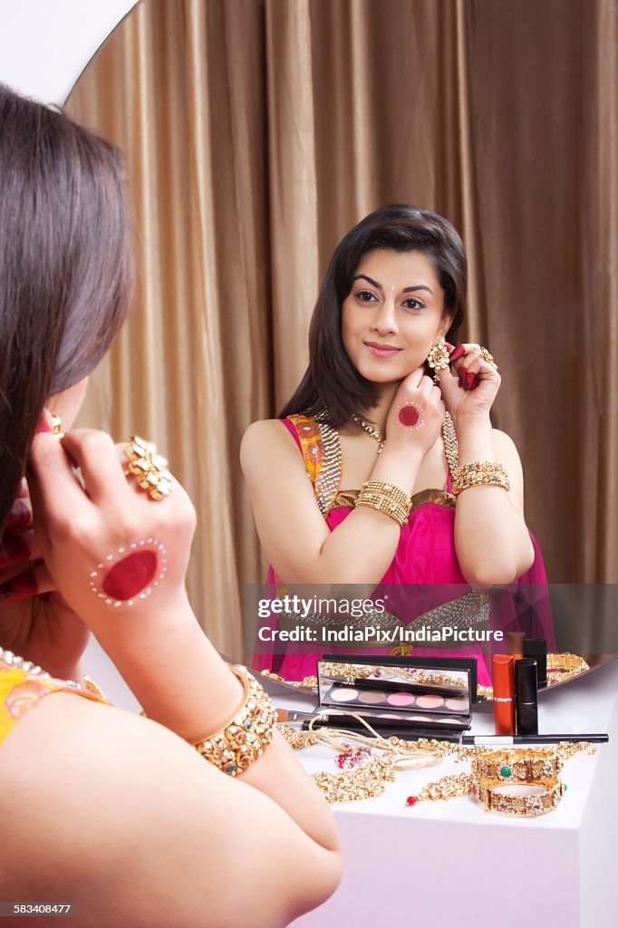 Beautiful woman wearing earrings