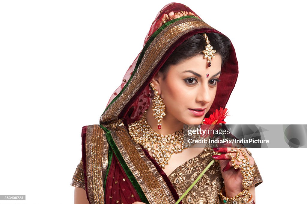 Beautiful bride with a flower