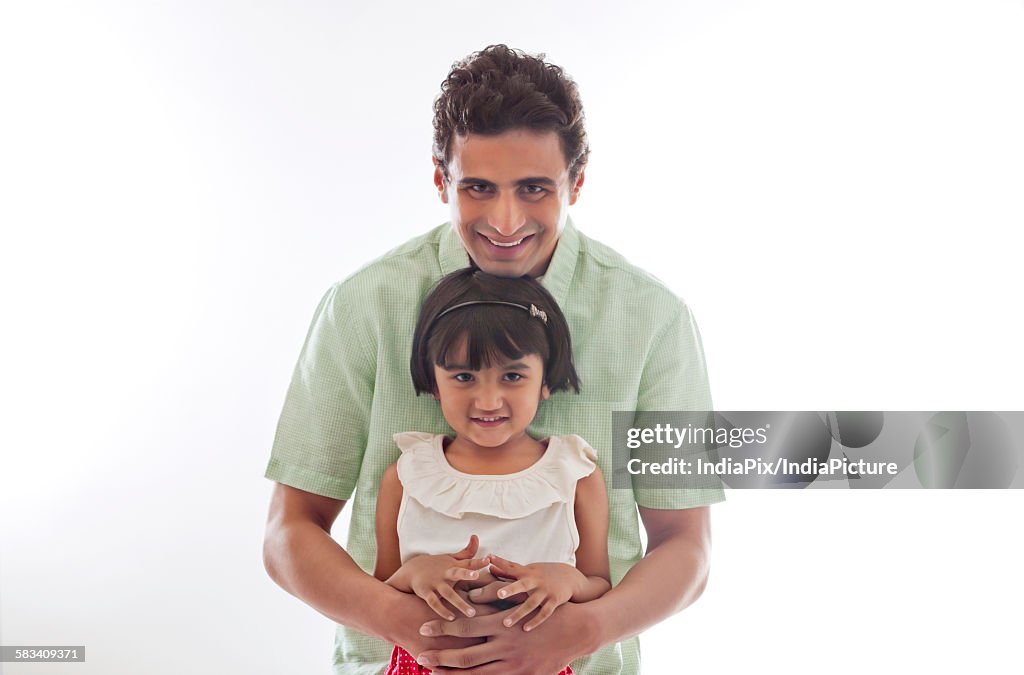 Portrait of father and daughter