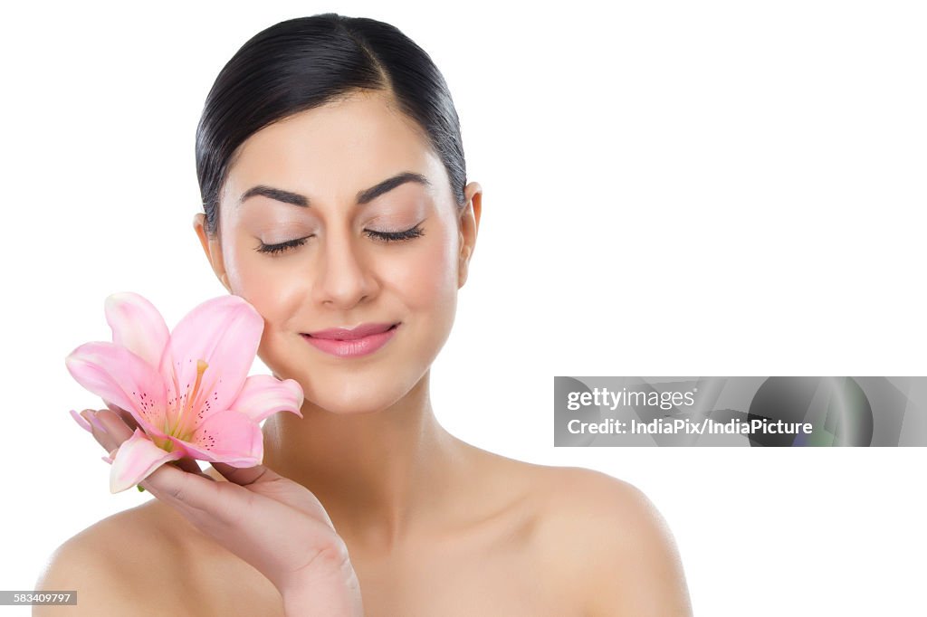 Beautiful woman with a flower