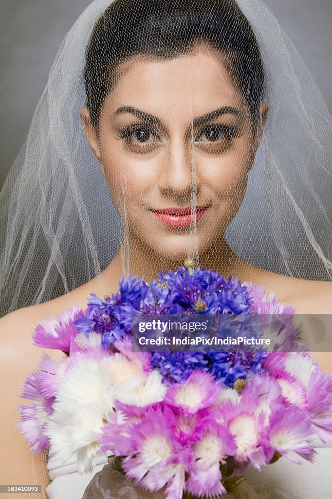 Portrait of a bride with flowers