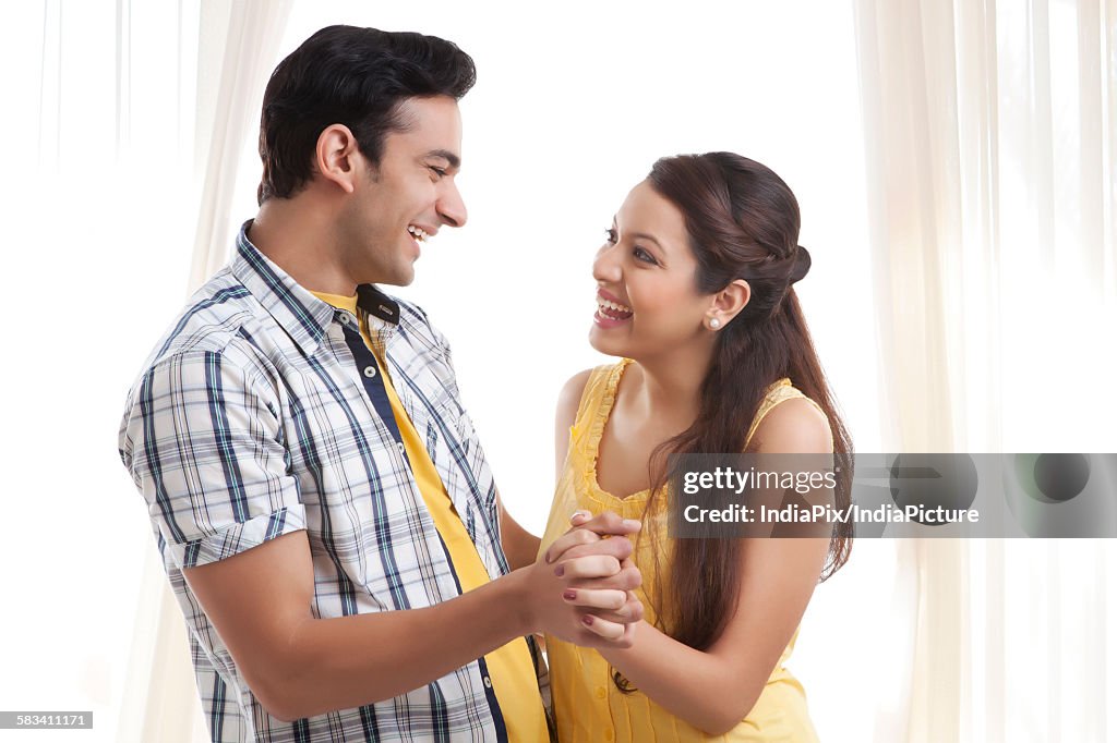 Young couple dancing together