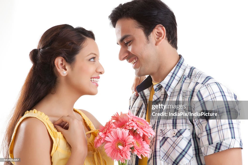 Young couple with flowers