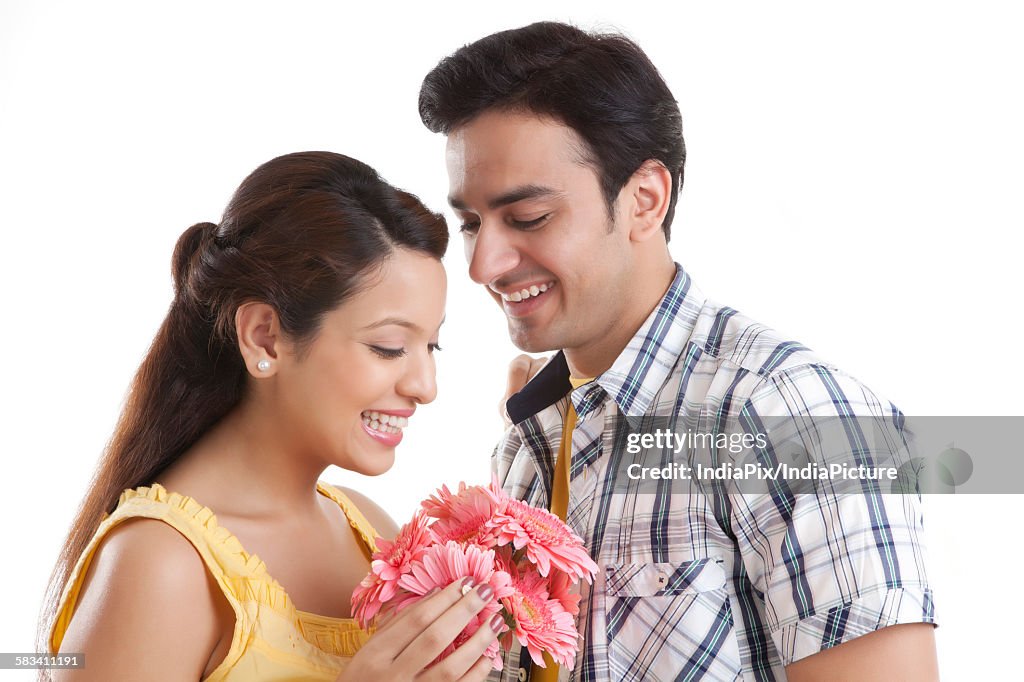 Young couple with flowers