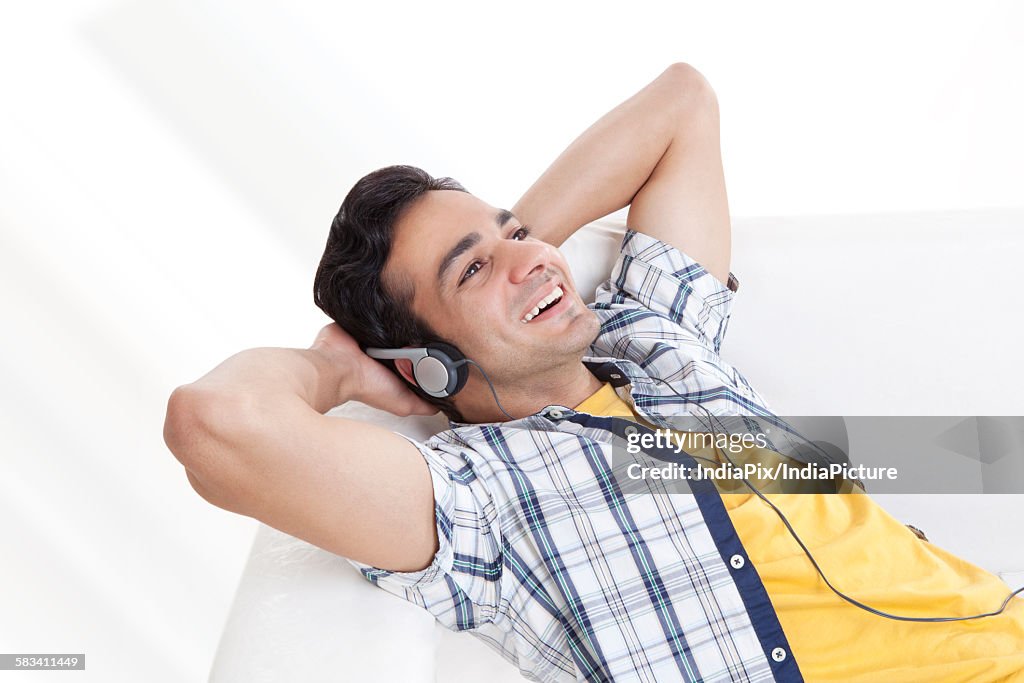 Young man listening to music