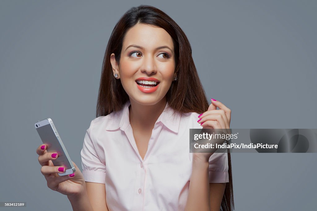 Female executive with a mobile phone