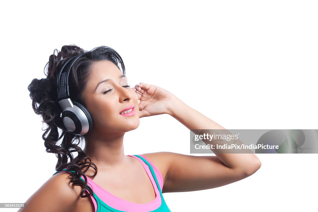 Young woman listening to music