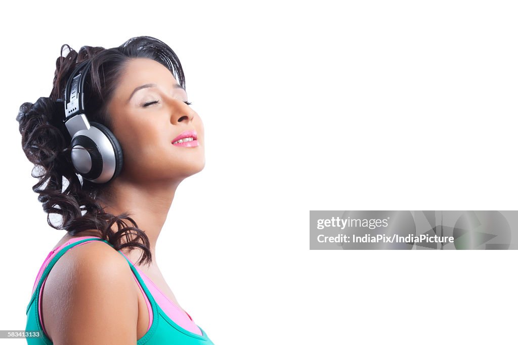 Young woman listening to music