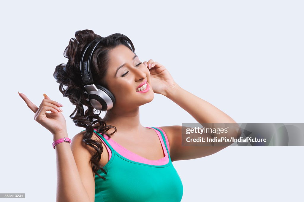 Young woman listening to music