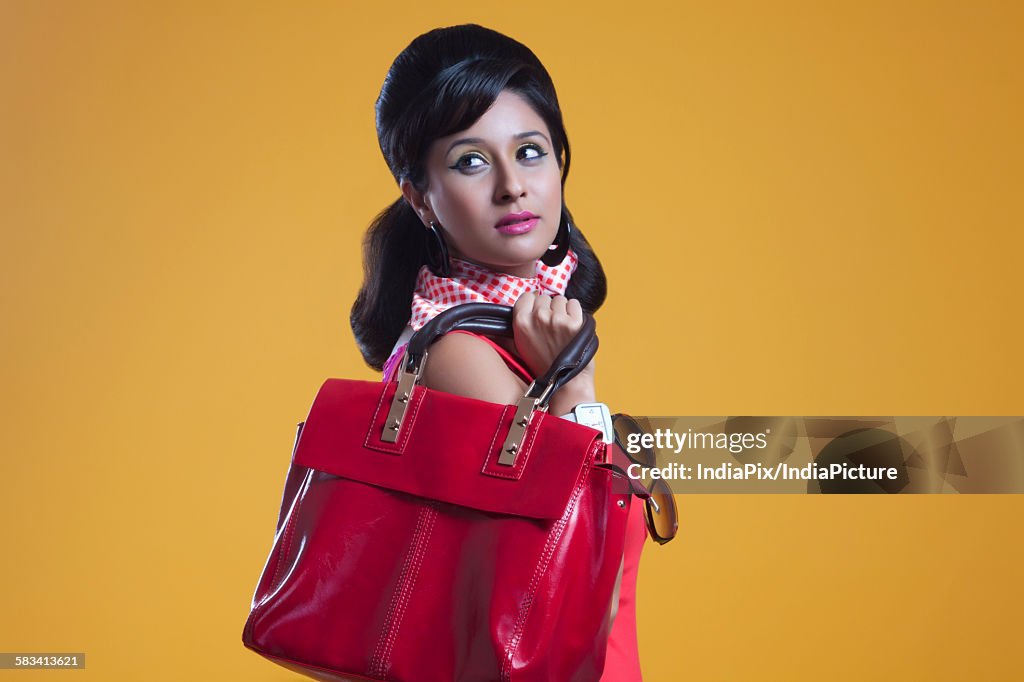 Retro woman with hand bag