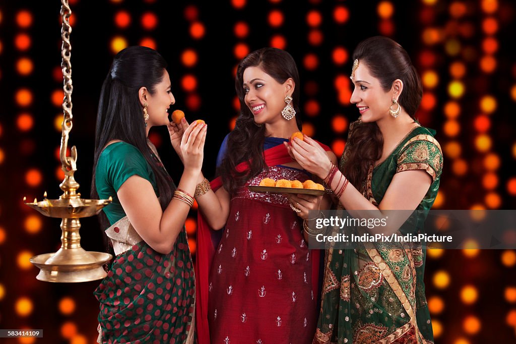 Young women celebrating Diwali