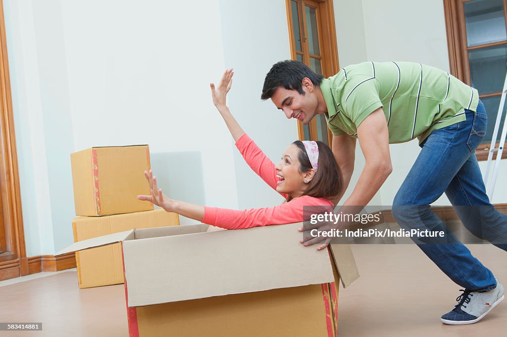 Young couple moving house