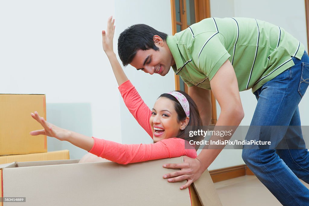 Young couple moving house