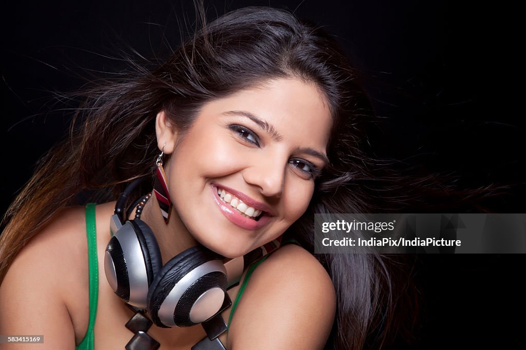 Young woman posing with headphones