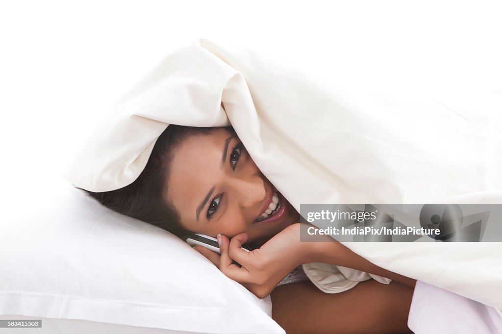 Portrait of girl talking on mobile phone